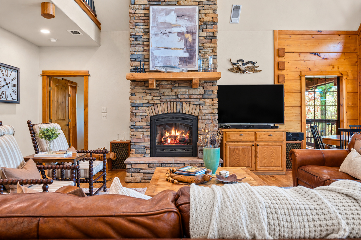 Cozy up by the stone fireplace and settle into vacation mode.