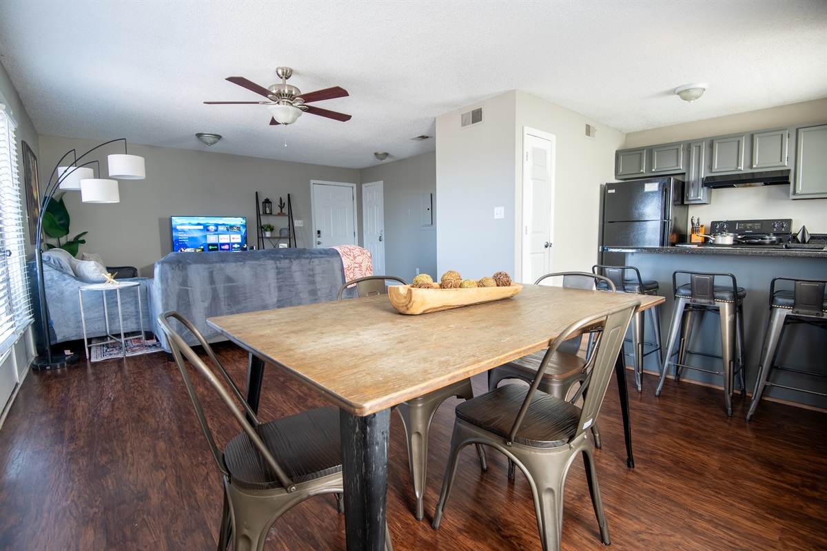 The dining area has plenty of seating for everyone to gather together for their favorite meal or a game of cards - you choose!