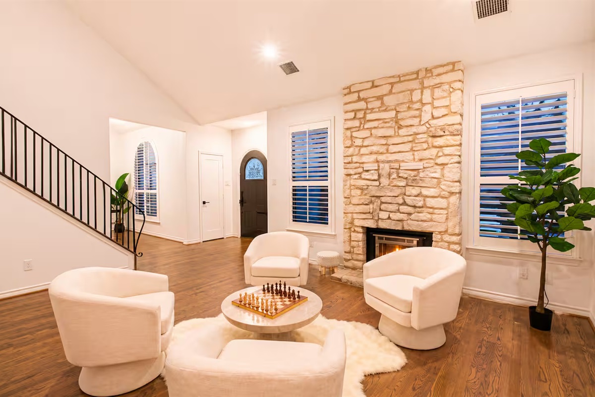 Bright, open living area with soaring ceilings and welcoming natural light
