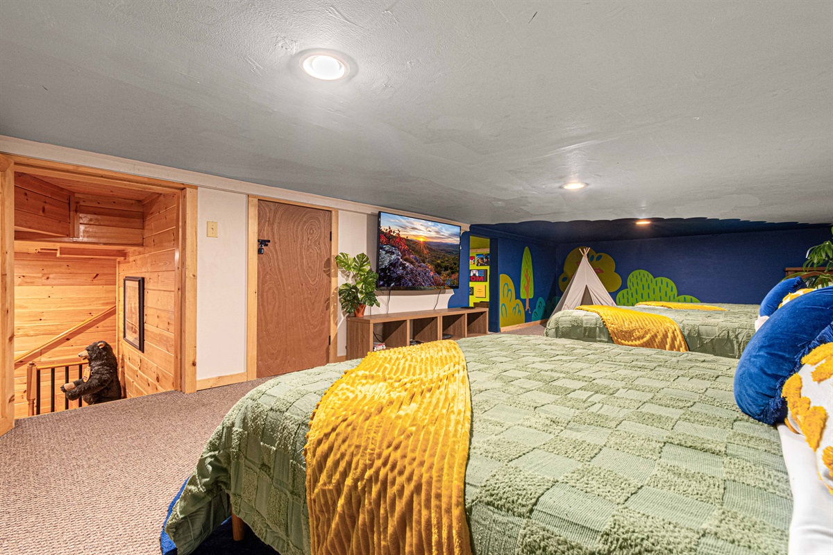This uniquely designed bedroom is perfect for families or groups.