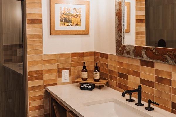 A closer look at Cutter's Quarters Bathroom #2 &mdash; curated Western details and the privacy of two en-suite baths in one upstairs suite.