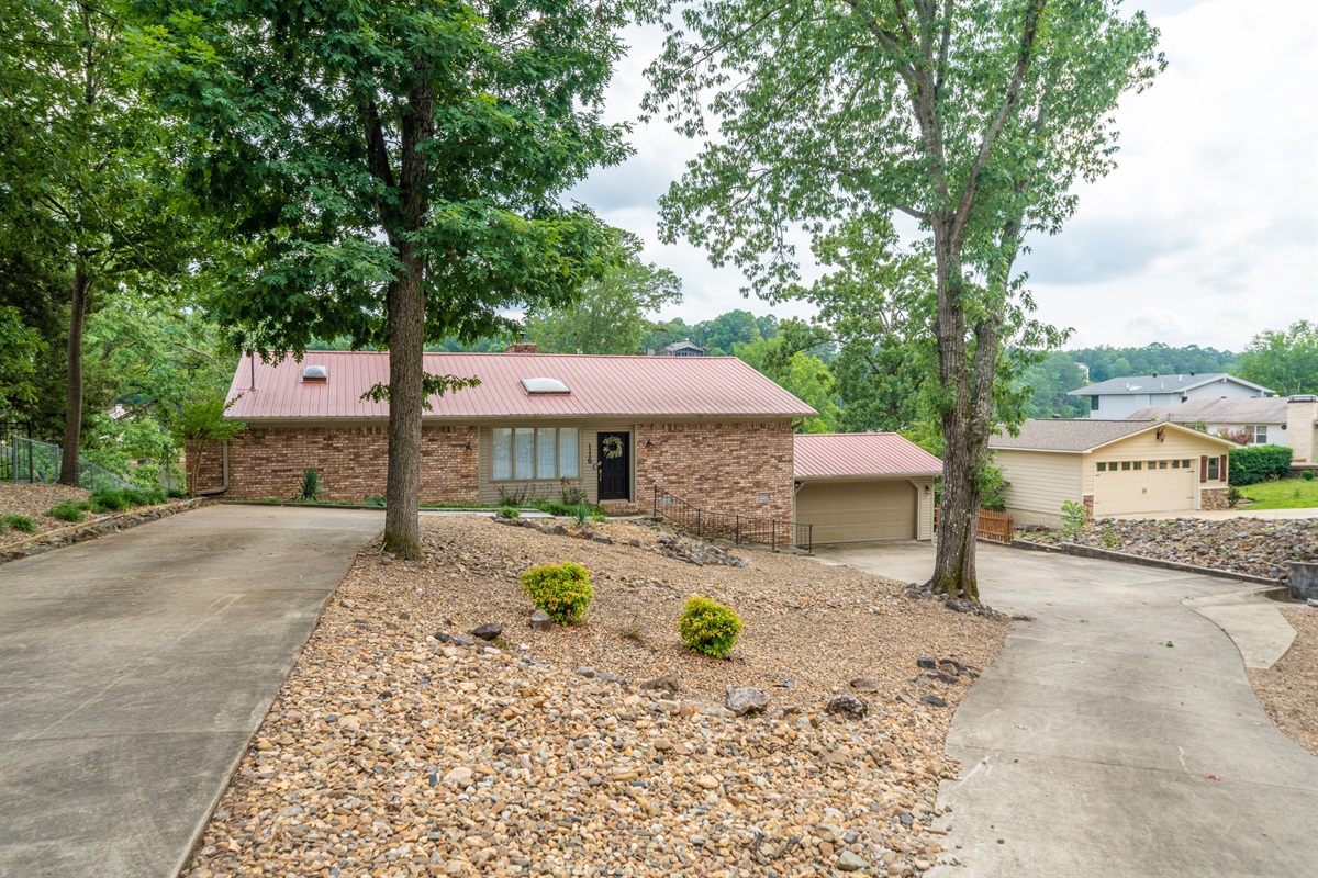 Plenty of Driveway Space for Parking.  Room for Up to 4 Cars and a Boat Trailer.