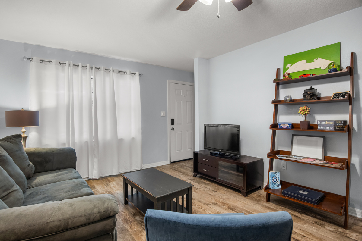 Front door entrance leads into the family room. TV.