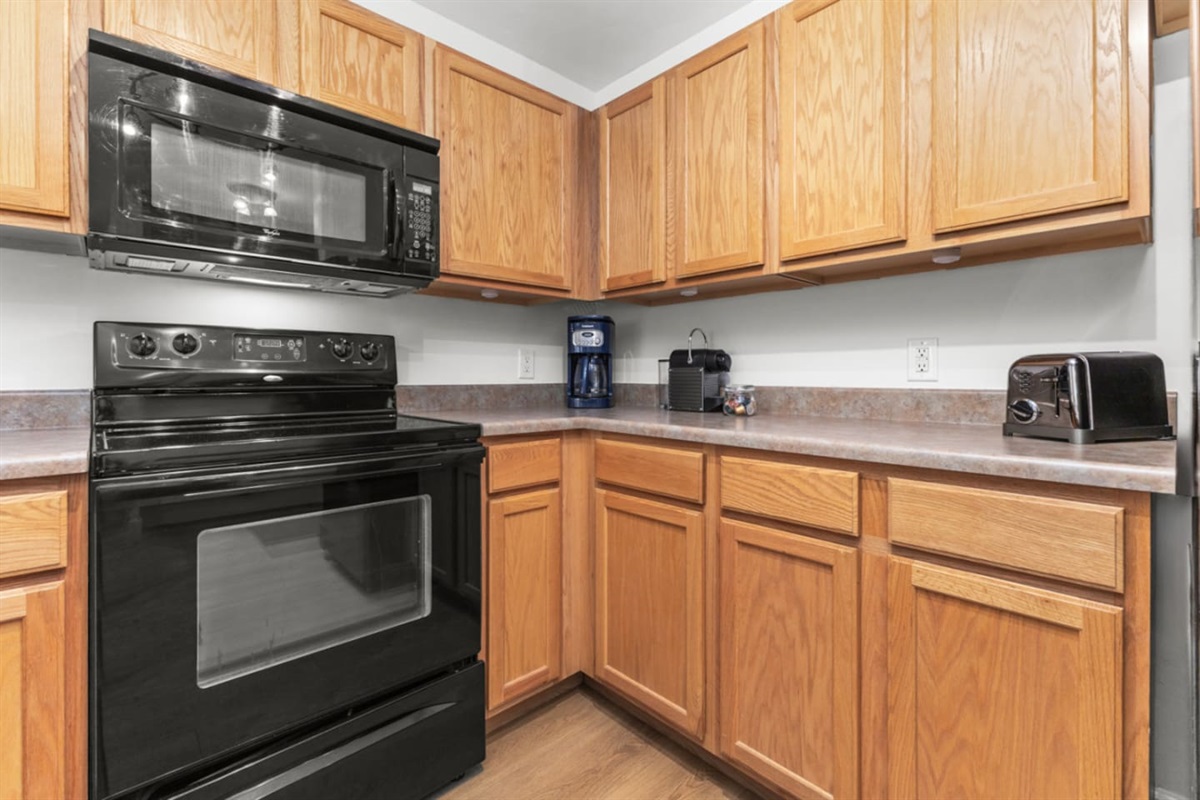Kitchen | 4 burner electric stove | Bread Toaster 