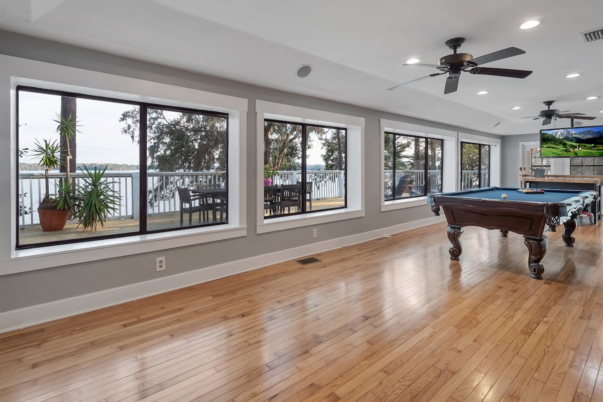 Pool table, lake view, stool seating, tv
