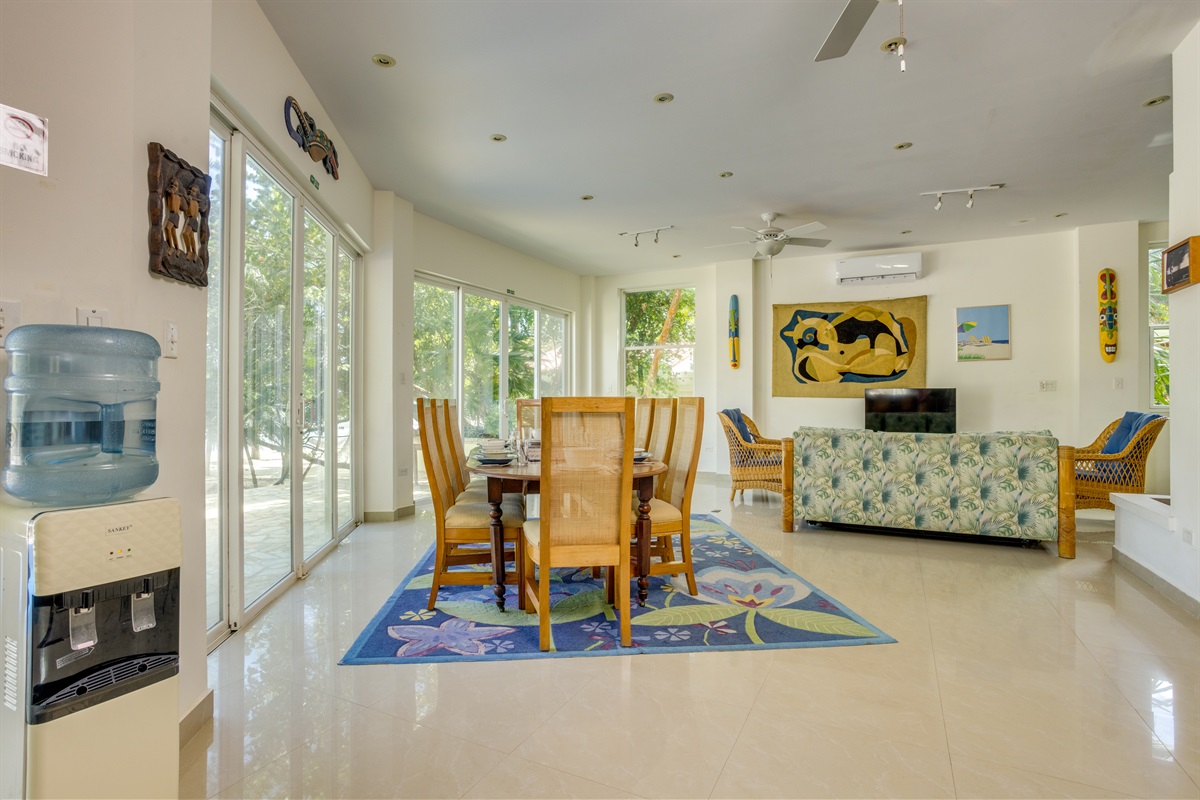 Open Space living area with Dinning room table and water cooler