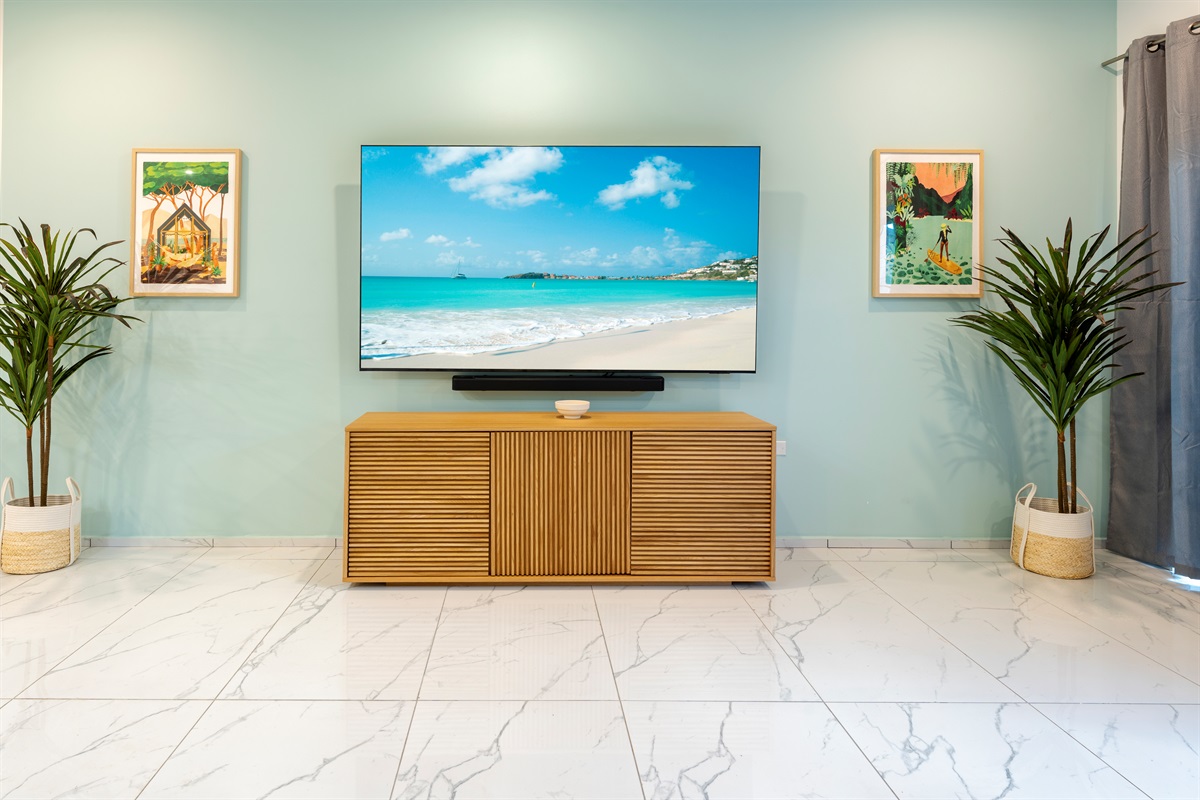 Entertainment Nook with Smart TV, Natural Wood Console & Greenery