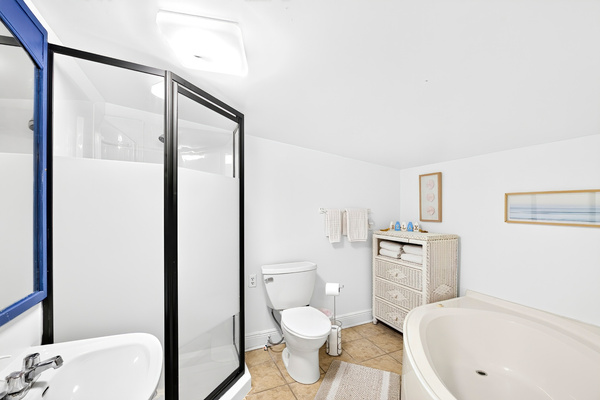 Bathroom with stand up shower + garden tub