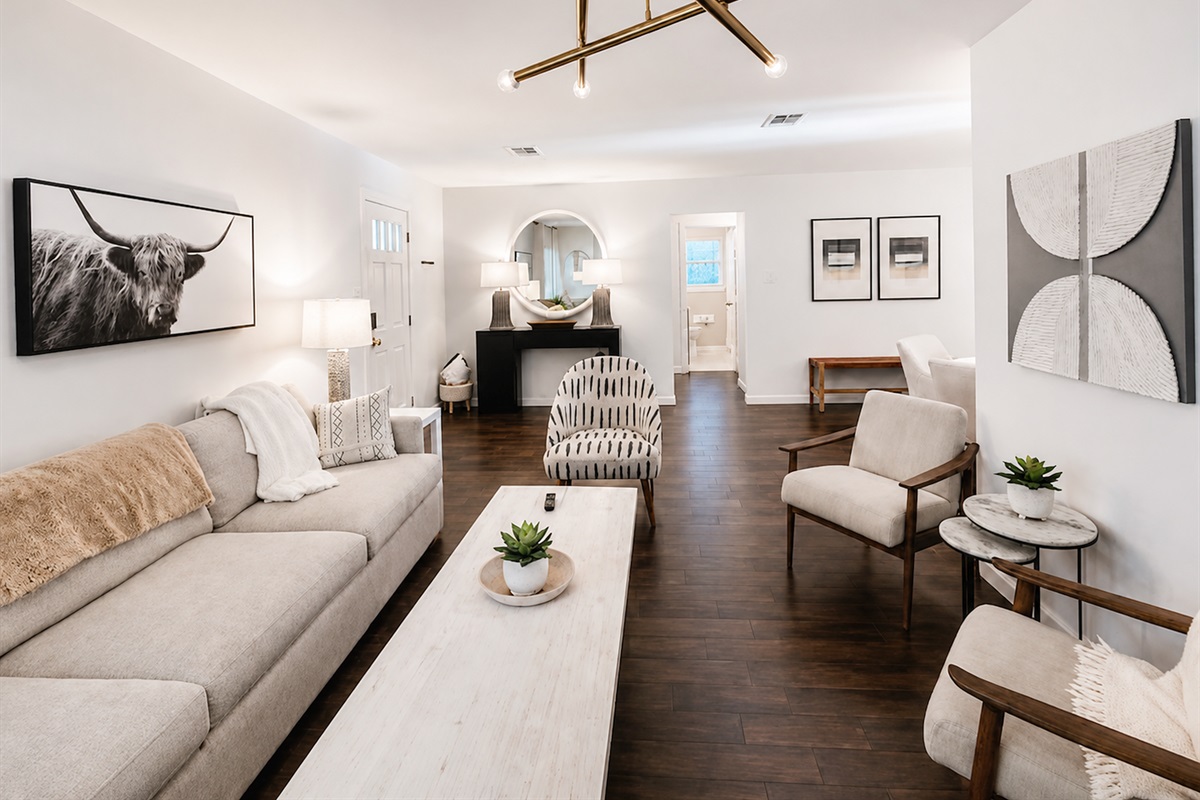 Spacious open-concept living area designed for relaxing, entertaining, and gathering together in comfort