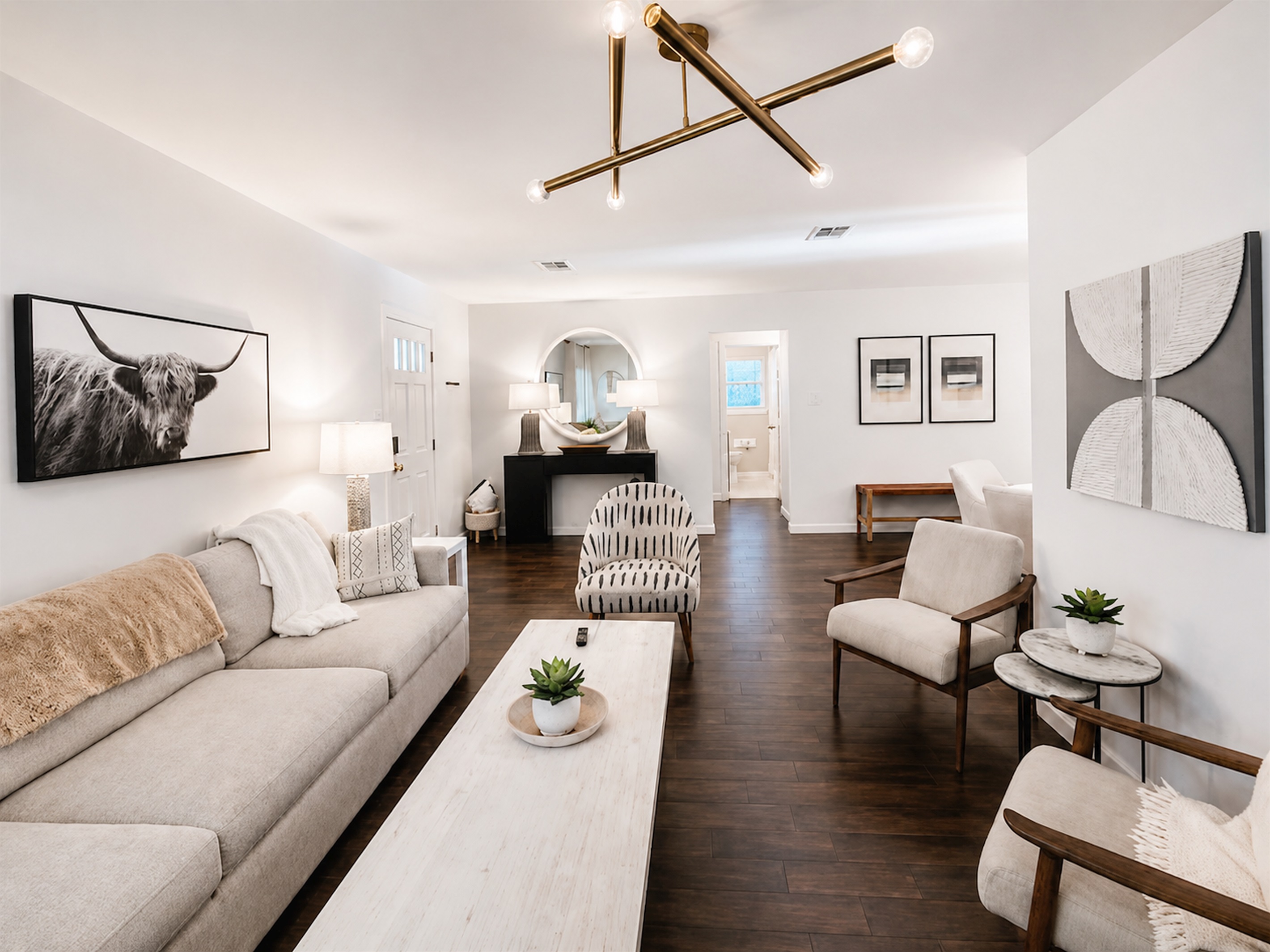 Spacious open-concept living area designed for relaxing, entertaining, and gathering together in comfort