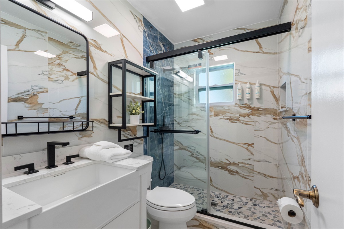 Though compact in size, the bathroom offers everything you need with smart design and efficient use of space.