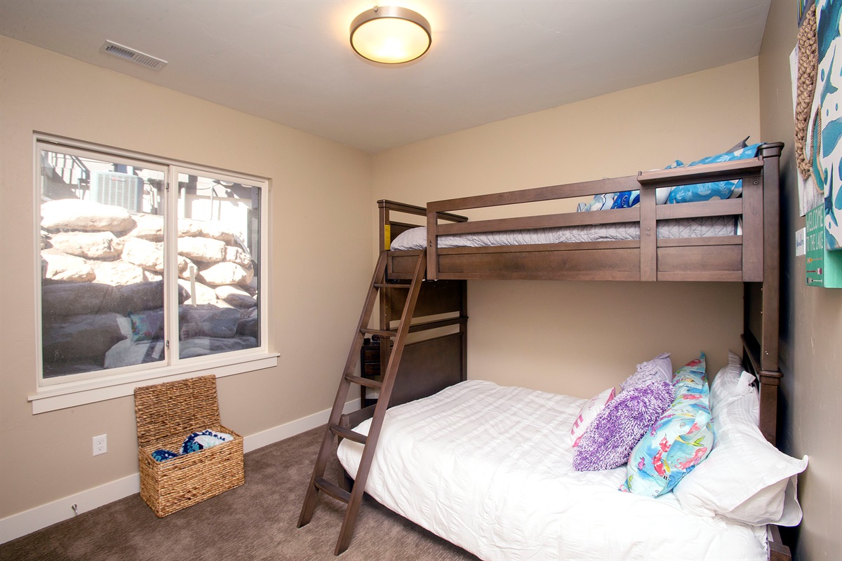Fun bunk room—perfect for kids or extra guests, with plenty of natural light.