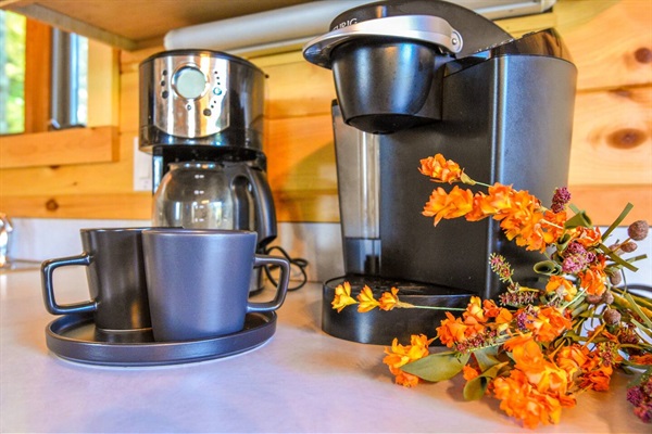 Enjoy your morning coffee with either a Keurig or a drip coffee maker.