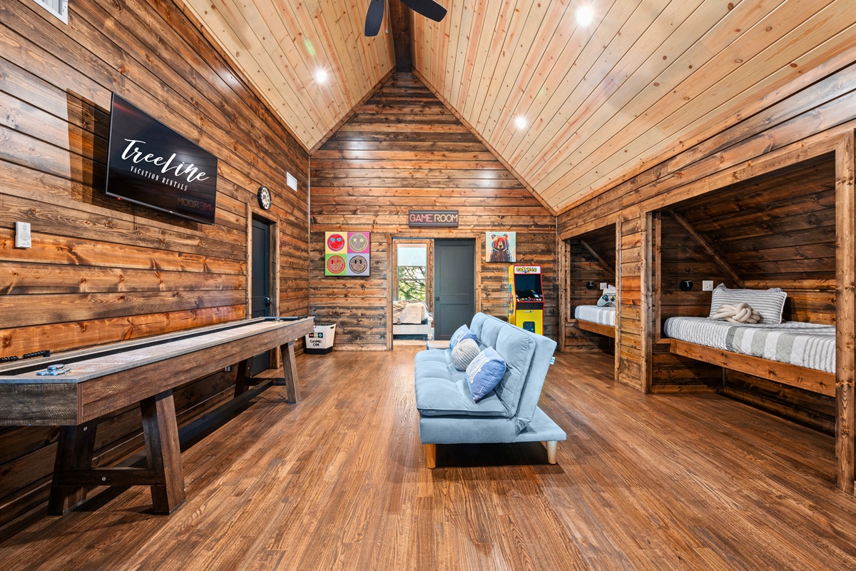 With a wide-open layout and cozy seating, this game room is a great hangout spot for kids, teens, and adults alike.