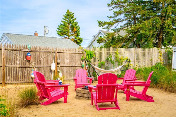 Cozy up by the firepit and enjoy a warm, relaxing evening under the stars.