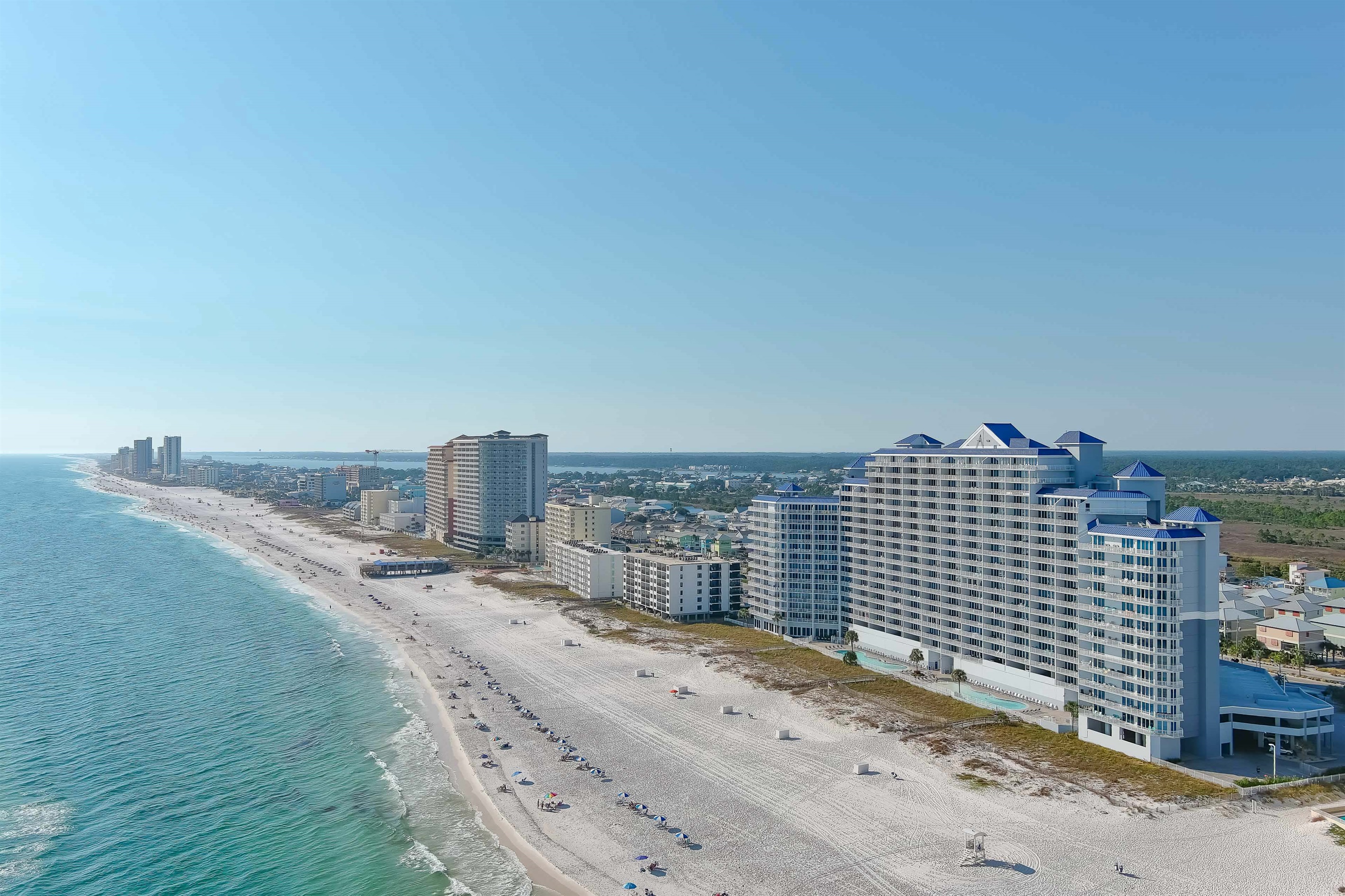 Wake up to this stunning panoramic view of the beach.  Your dream vacation starts here.