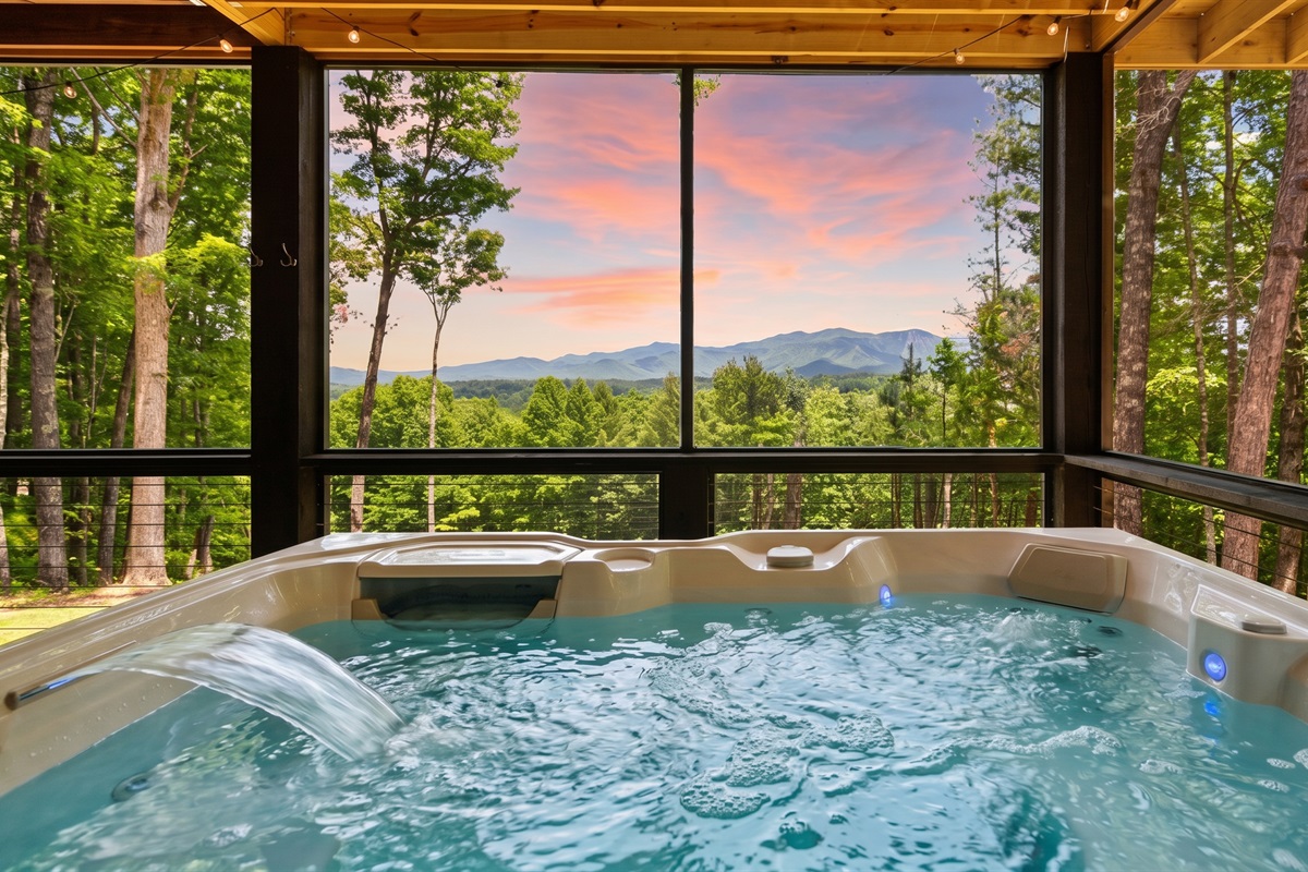 Soak in the six-person hot tub while taking in endless mountain and sunset views. 
