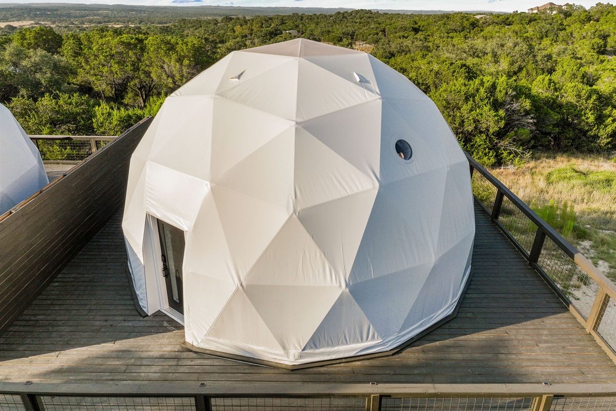 Your stay begins with sunrise views framing a striking geodesic dome — a peaceful escape blending modern design with nature.