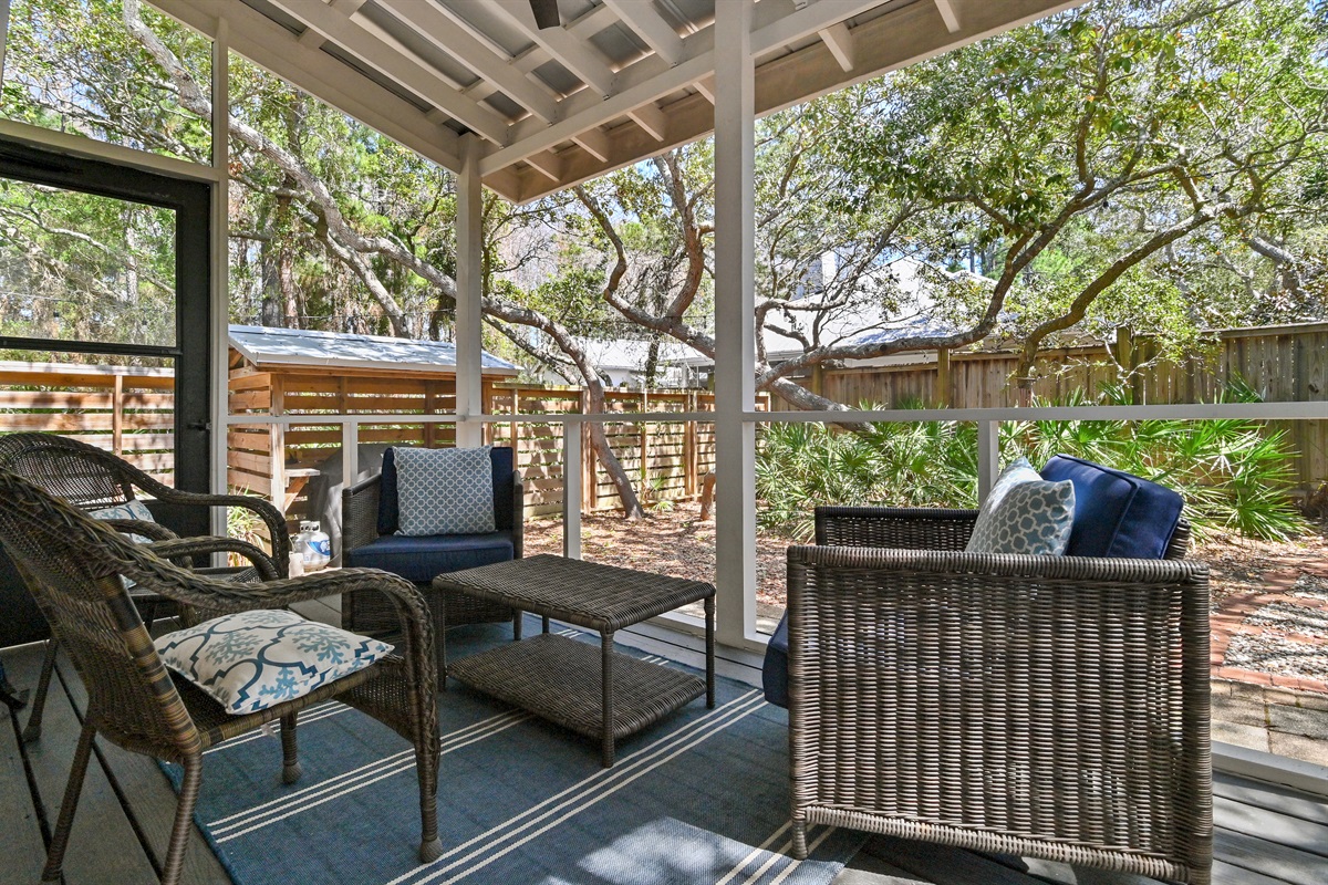 Screened porch with comfortable outdoor seating