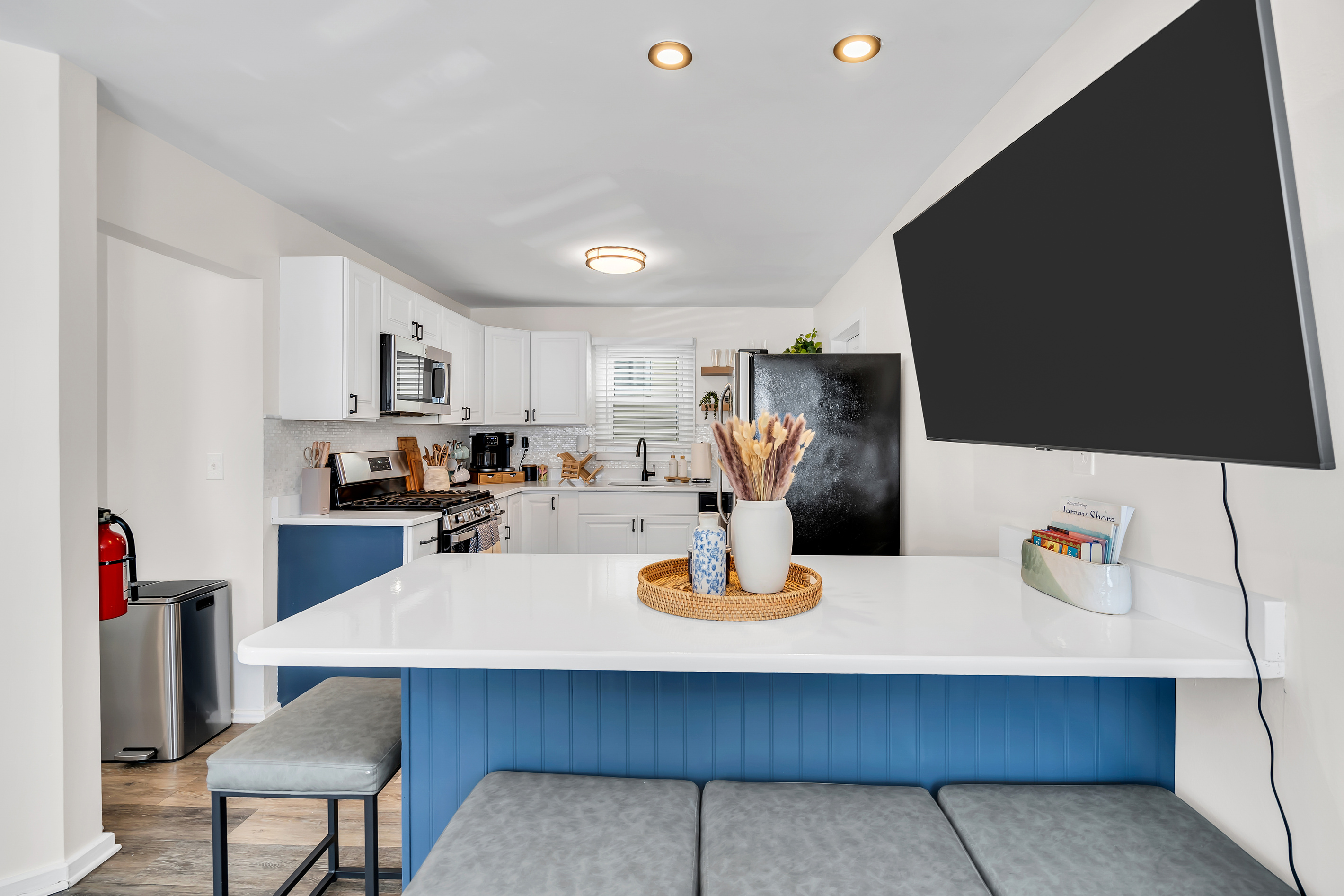 Pull up a stool at the island and keep the cook company. This is where coffee gets poured in the morning and snacks disappear in the afternoon after a solid beach day.
