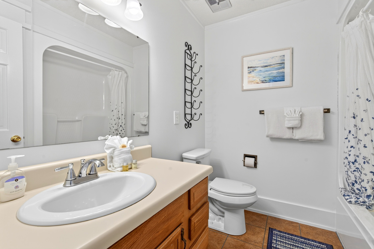 Upstairs bathroom with shower and tub combo