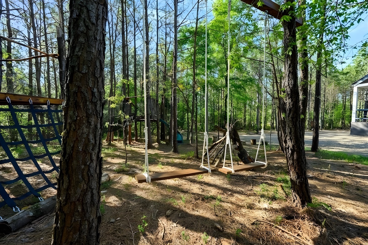 Tall pines surround the cabin, offering privacy and that peaceful, away-from-it-all feeling.
