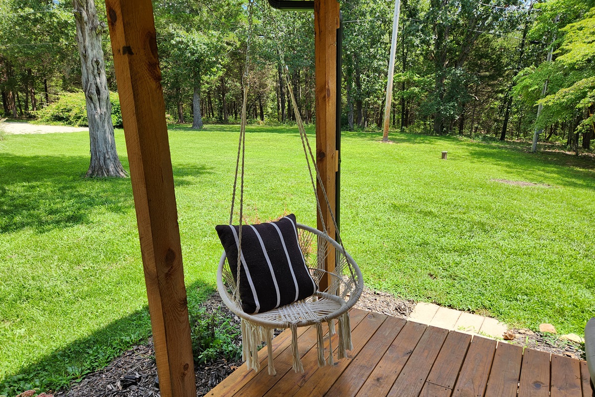 Unwind in the swing hammock chair on the front porch&mdash;perfect for sipping coffee and soaking in the surroundings.