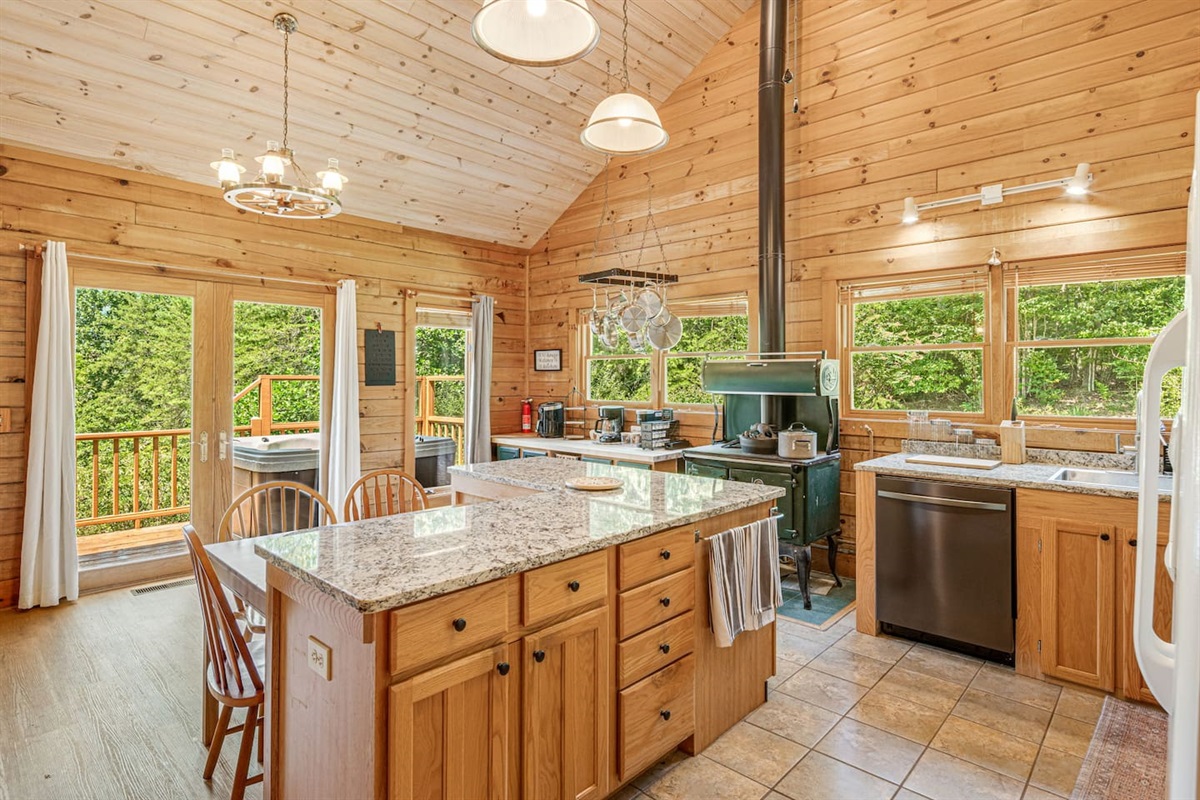 Cook up a feast in this spacious, light-filled kitchen! Whether you're making breakfast before a hike or enjoying a family dinner, this inviting space is perfect for creating memories and savoring the simple joys of mountain living