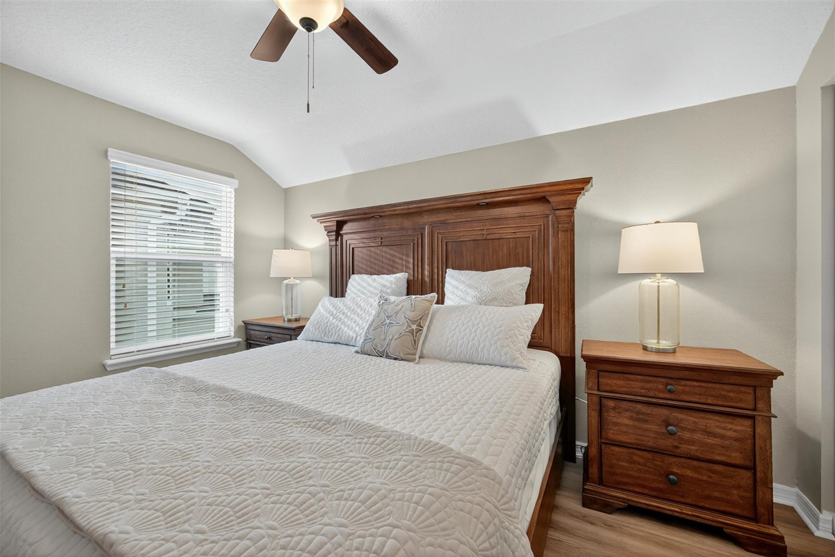 Relaxing bedroom retreat with king bed and soft lighting.