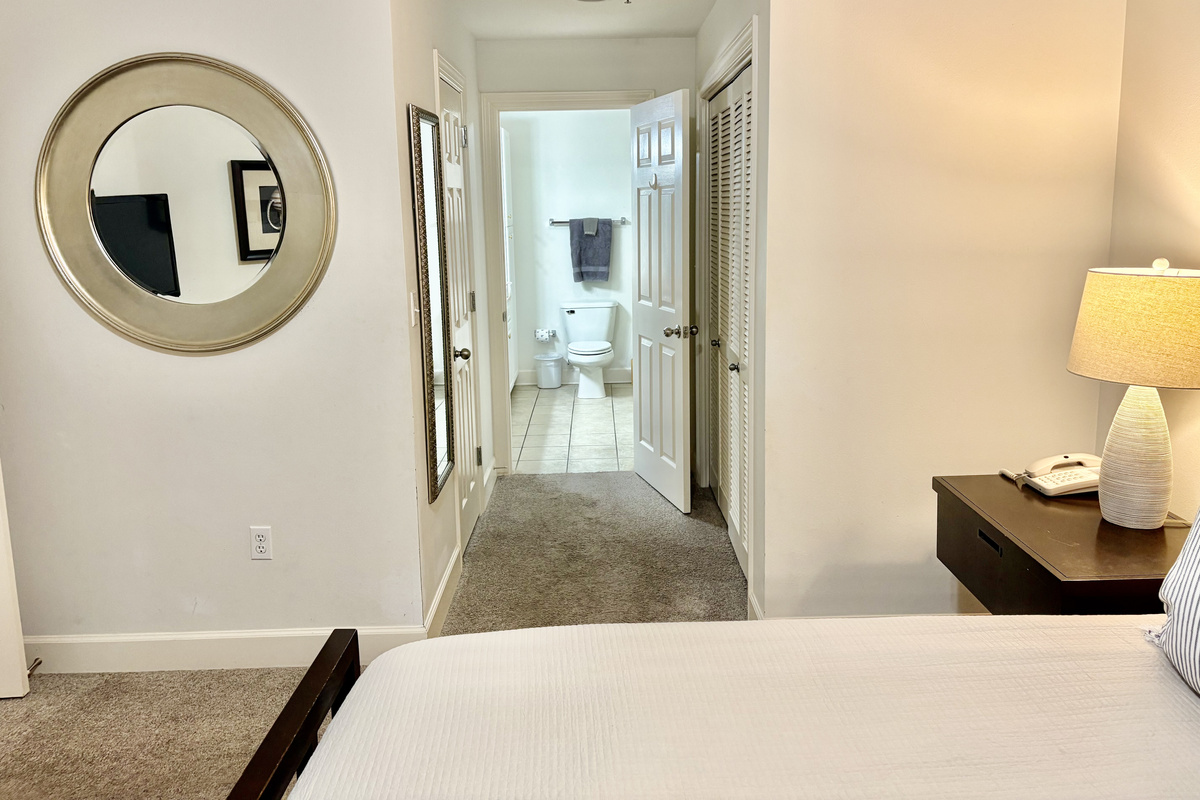 There are TWO walk-in closets in this hallway leading to the master bath!