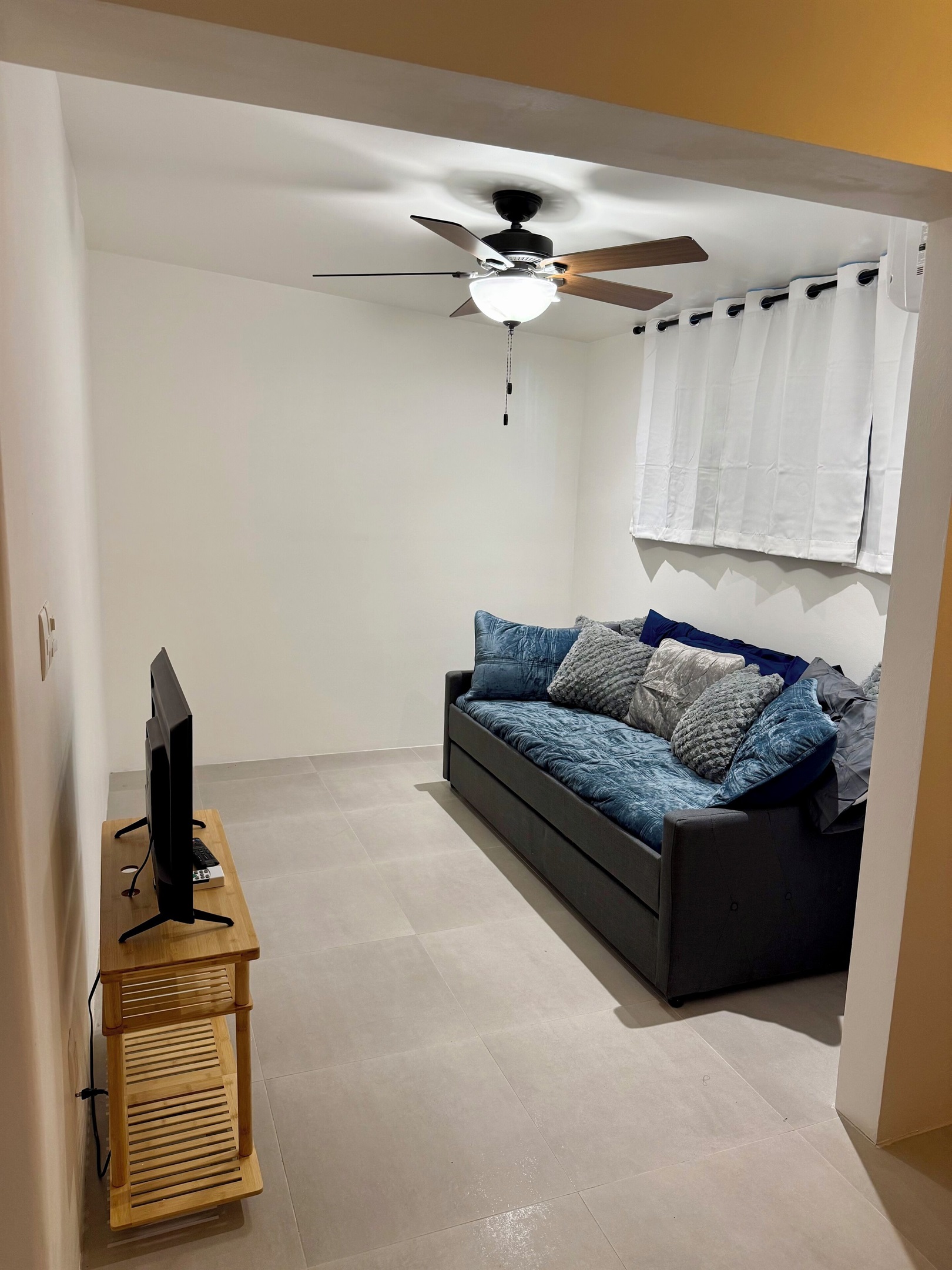 Sitting area for BR 3 or a kid bedroom 4.  Two twin trundle bed, Barn door, AC 