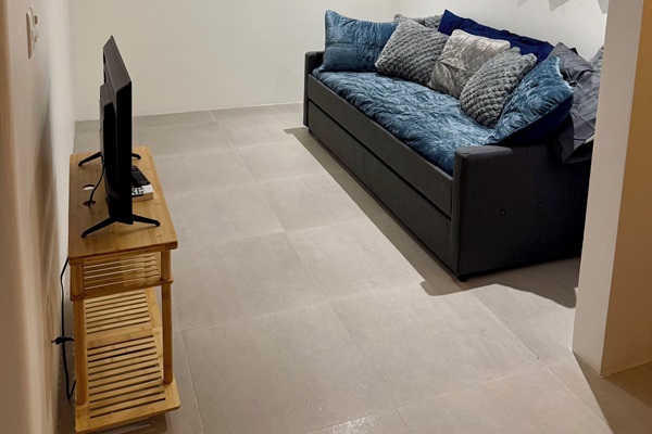 Sitting area for BR 3 or a kid bedroom 4.  Two twin trundle bed, Barn door, AC 