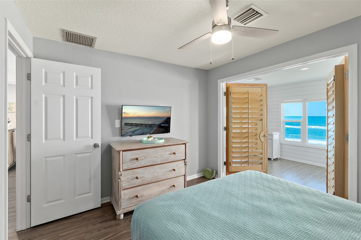 Relaxing second bedroom with smart TV