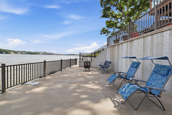 Cozy fire pit on the martini deck — perfect for s’mores and sunset nights