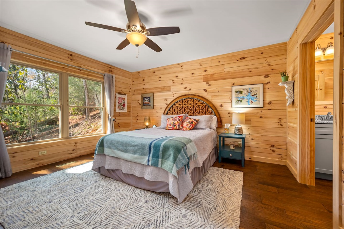 Bedroom #1 of the cabin with queen bed and en suite full bathroom