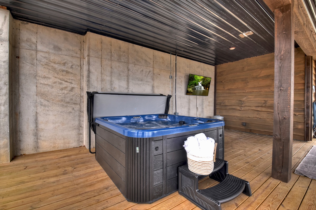 Enjoy incredible views or some TV while enjoying the hot tub