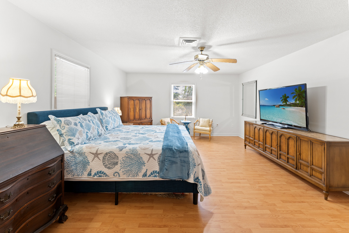 Main Bedroom upstairs with King bed, large TV and ensuite
