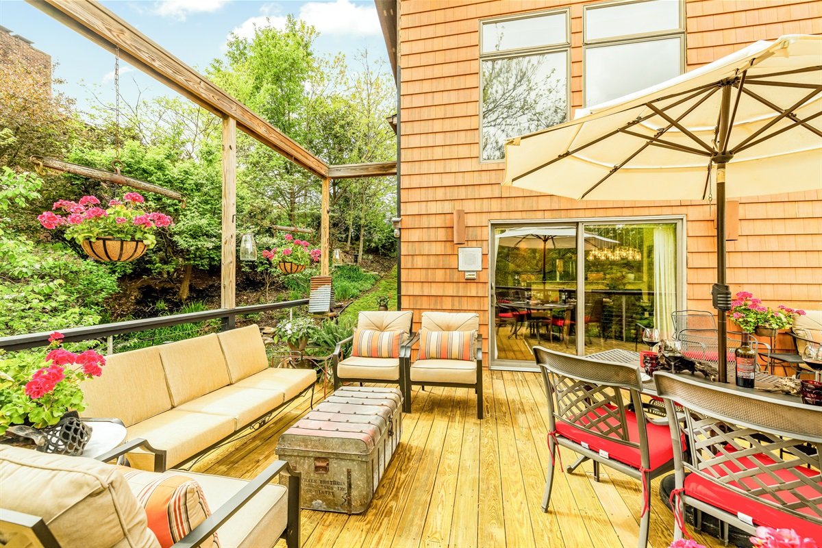 Your favorite beverage in hand. Favorite people sitting close. Soft wind whispers by. Wild birds flit over. No, you are not dreaming. Hilltop Oasis - a world away from it all.