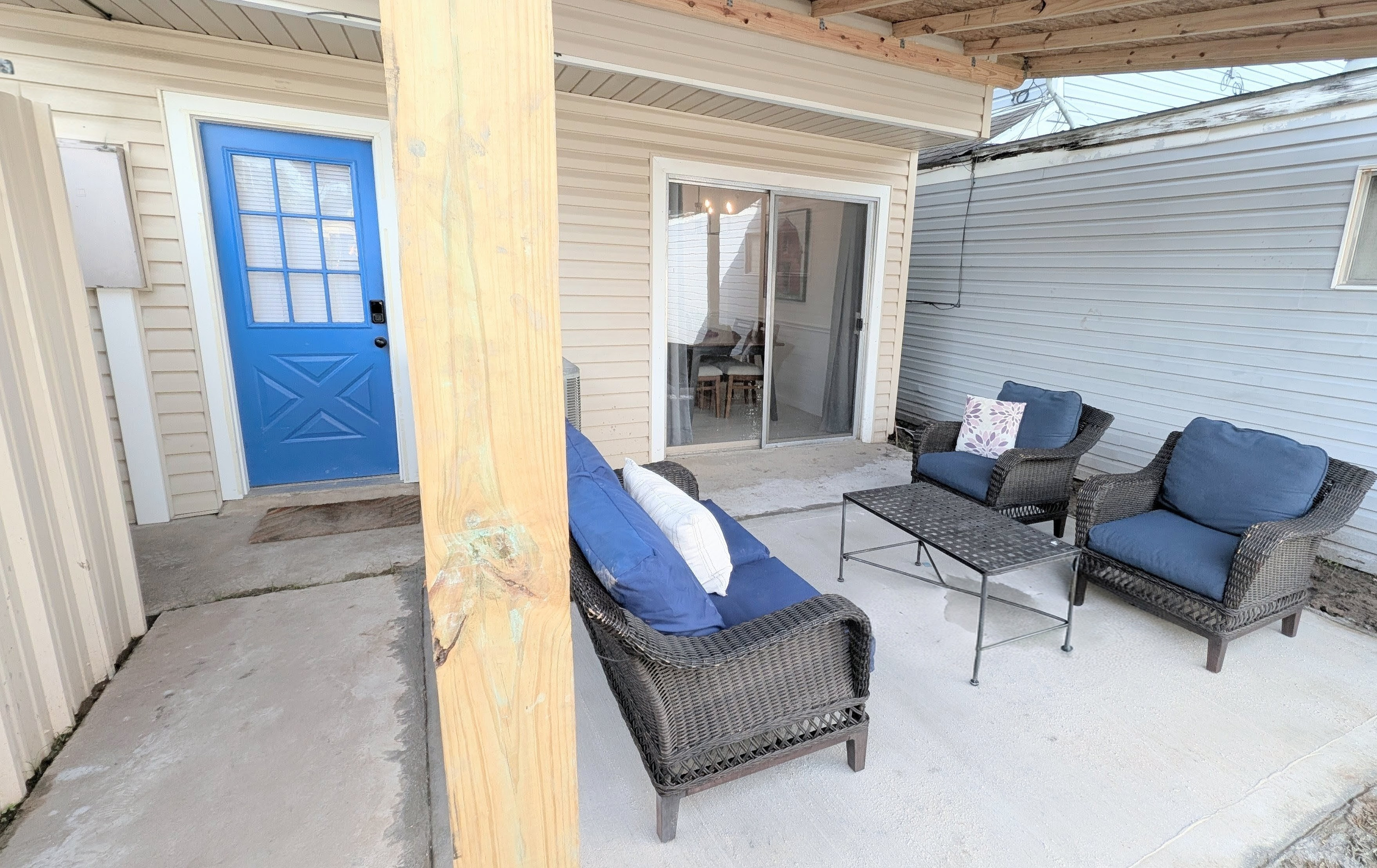 Access the home through the smart lock on the rear entrance and relax under the lights on the large covered patio. 