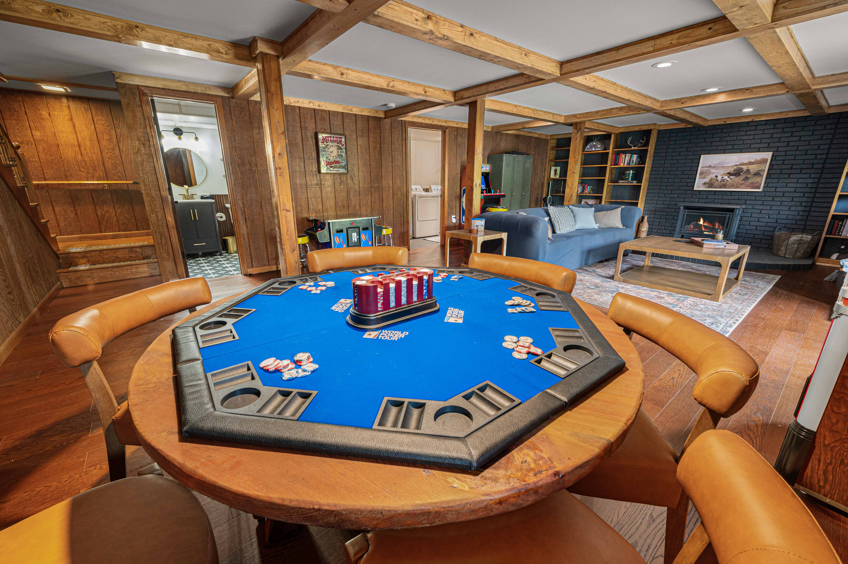 Game Room: Enjoy thrilling card nights at the stylish poker table in this vibrant space!