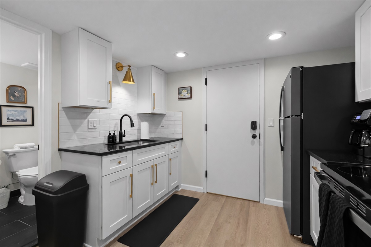 Stylish, well-appointed kitchen with modern appliances, sleek finishes, and smart storage—designed for easy cooking and everyday comfort.