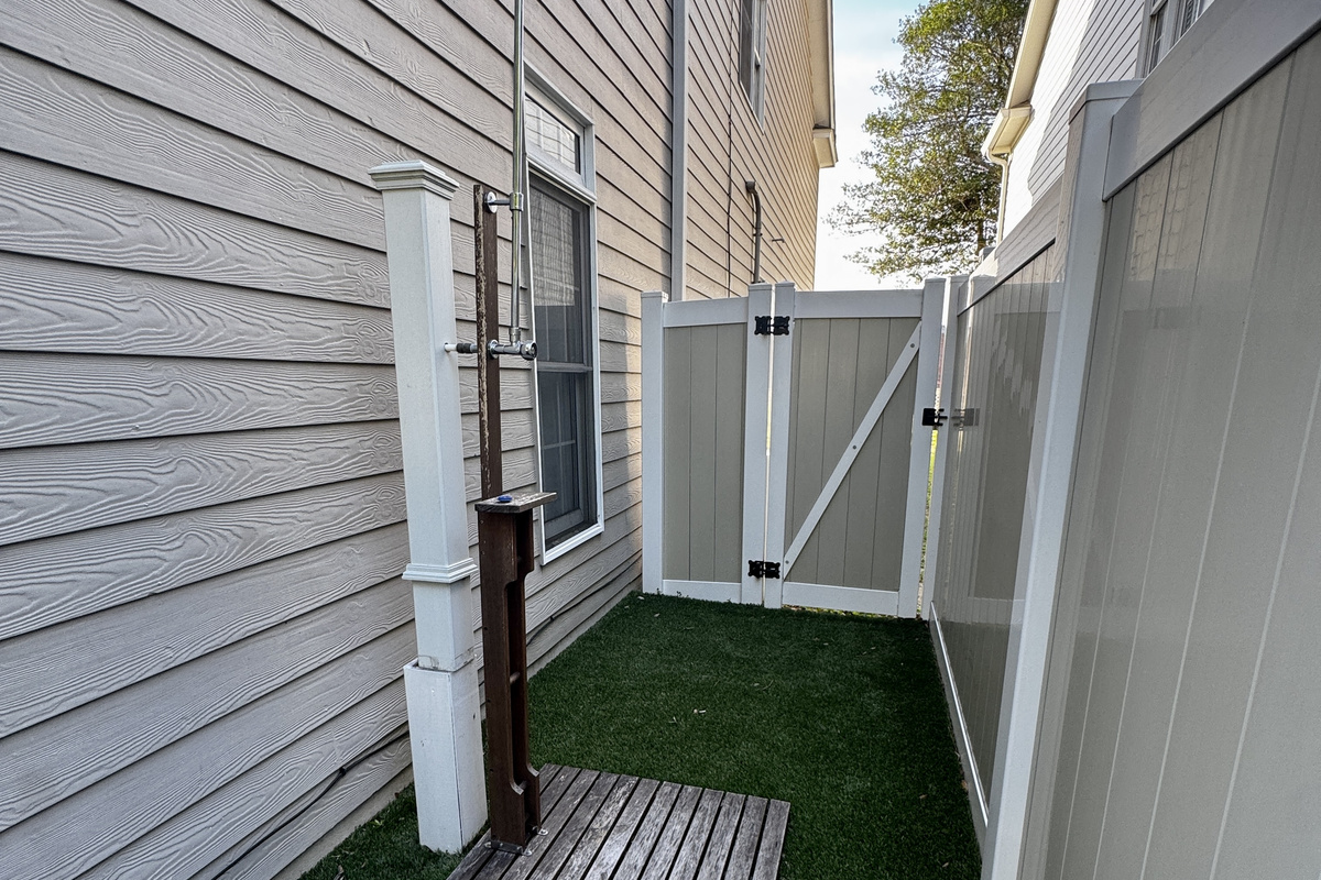 Private outdoor shower — rinse off the sand before heading inside, a true beach house essential