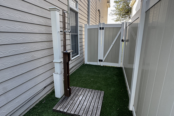 Private outdoor shower — rinse off the sand before heading inside, a true beach house essential