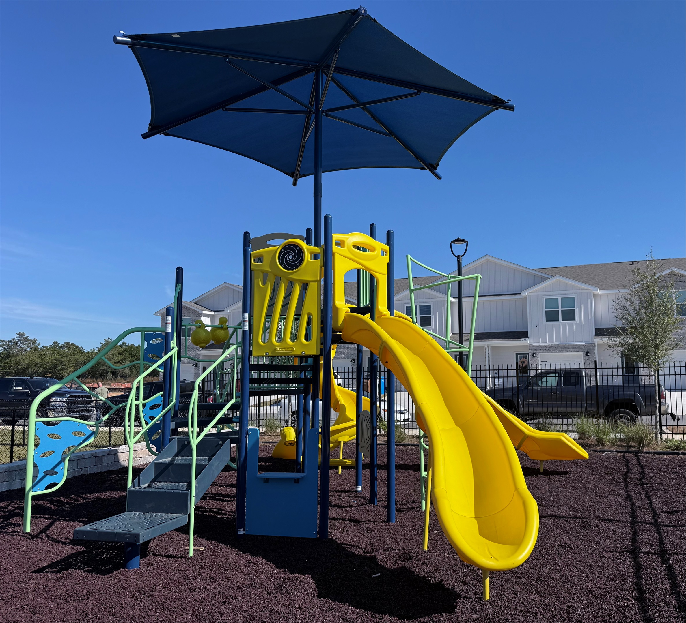 Kiddo recreation area complete with gated access and separate from the pool area. Fun, safety, and piece of mind.