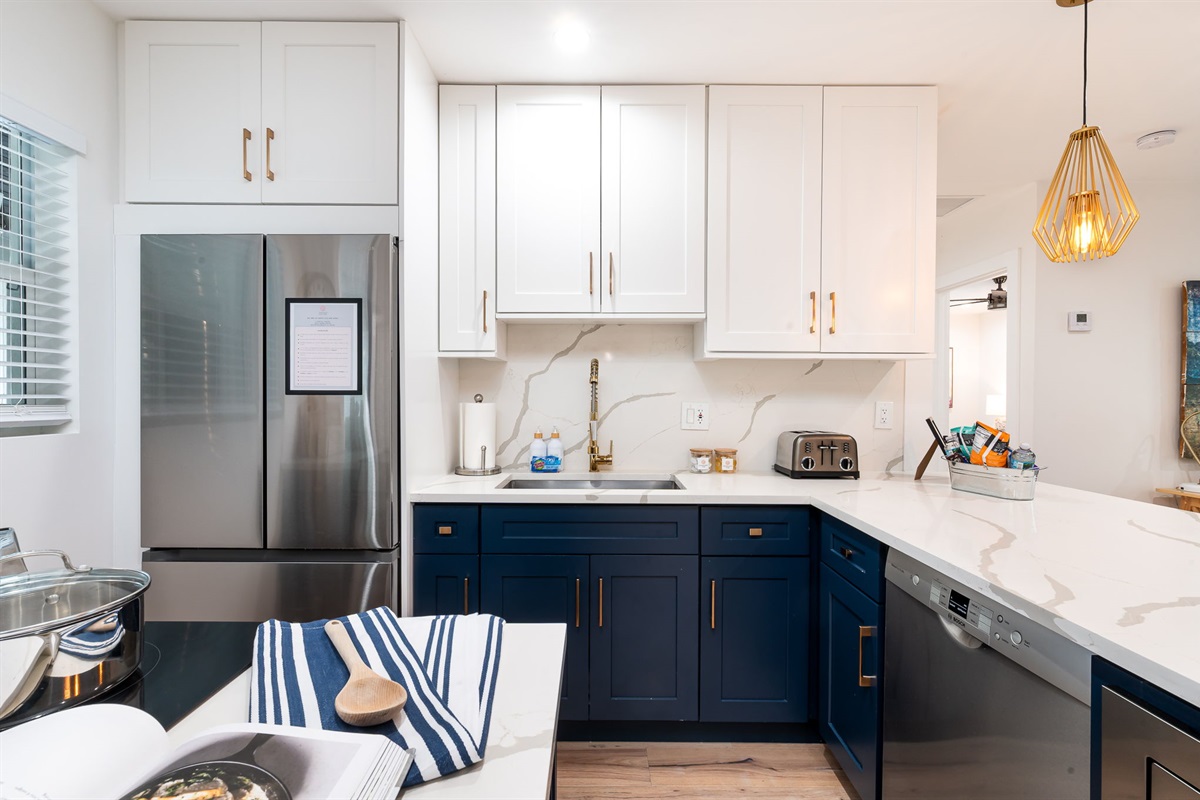 This bright and cheerful kitchen is the perfect place to gather, prep, and make memories.