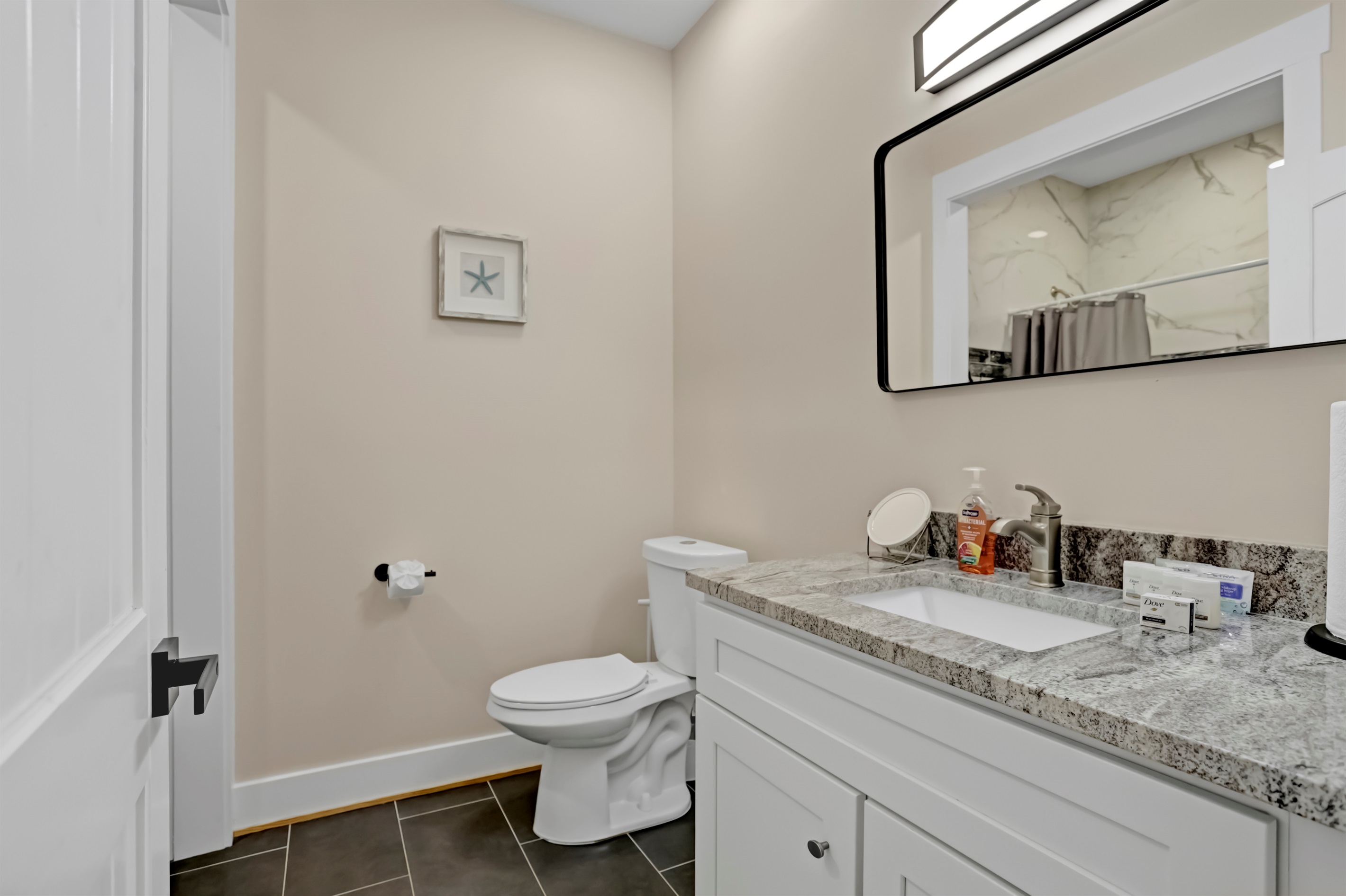 A bright, functional bathroom with all the essentials for your stay.