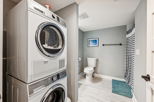 Laundry facilities in basement bathroom