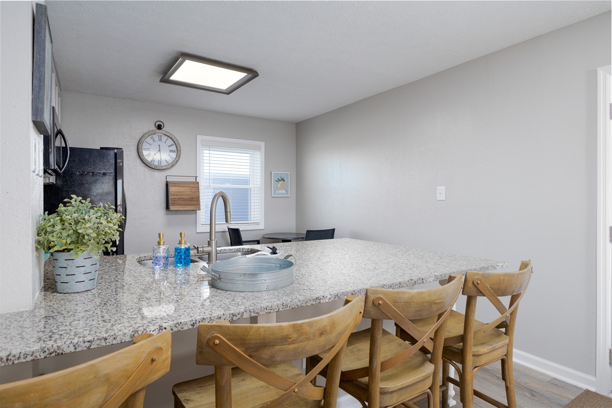 Dining and kitchen area seen from the living room