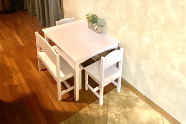 Sweet little spot off the kitchen and living room for the kiddos to eat or create some fun memories!