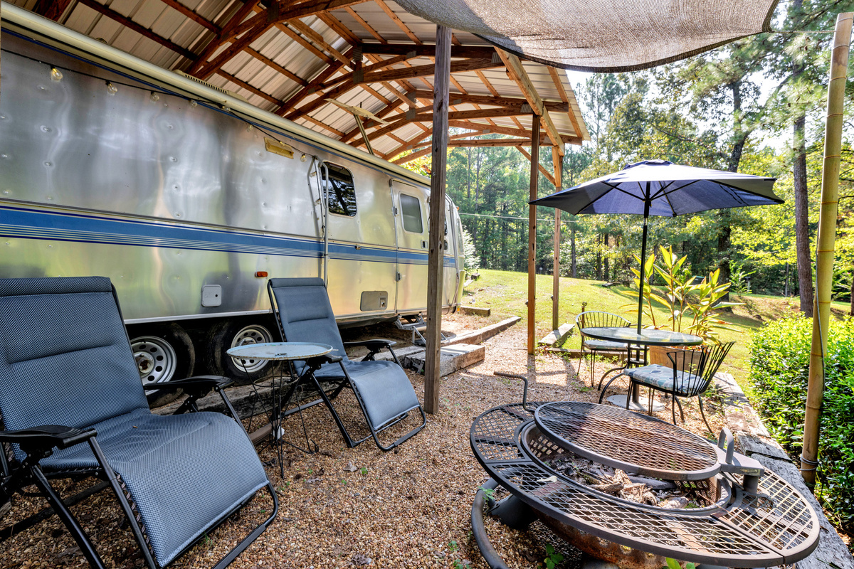 Your own covered outdoor hangout, complete with fire pit and room to unwind